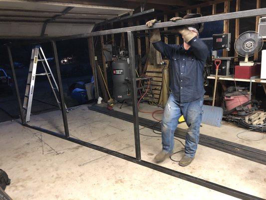 He start to a custom gate for a client.