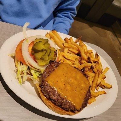 Iron skillet cheeseburger with fries