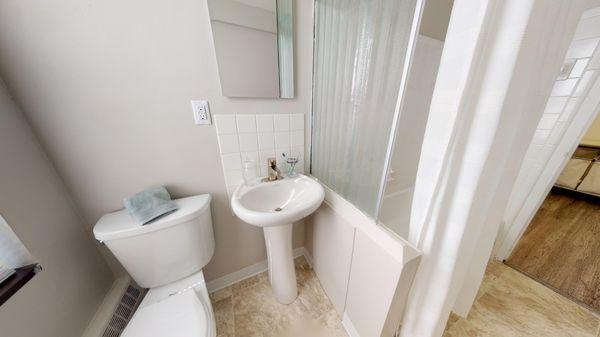 Sparkling white bathroom at 330 Oak Grove