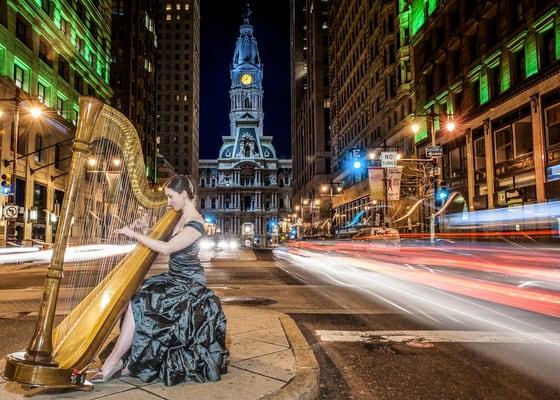 Playing the harp on Broad Street in Philadelphia