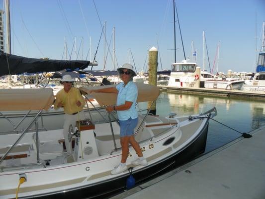 Com-Pac Yachts brand new electric boat with bimini tops designed and fabricated by The Canvas Yard, Inc.