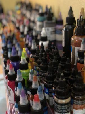 Lots of ink to choose from at Inked Tattoos.  Ron is working on Liz right now.