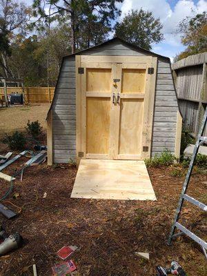 Little shed I fixed for a customer that had trouble getting in and out of the shed with the lawnmower