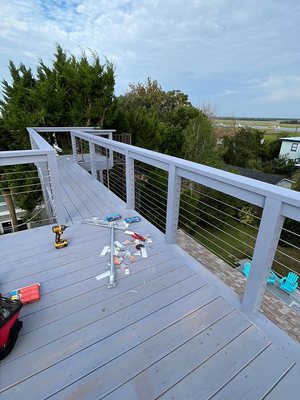 After- New deck and steel cable railings going in