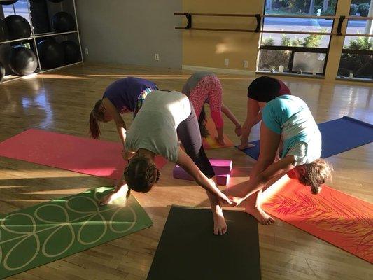 Teaching our younger generation about mindfulness, stretching, and love for one another.