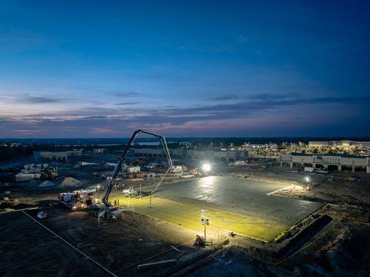 Early morning concrete pour for a Marshall's anchored shopping center at Babcock Ranch, FL.