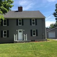 New Siding, roof, door, and rails.