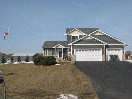 This home has LP Smartside siding and shakes and a new roof.