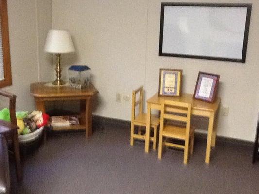 This room in my office suite is dedicated to families with children and group therapy.