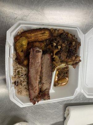 Oxtail, rice and pease, plantains w/ brisket on the side