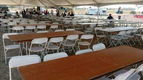 8 ft Banquet tables and our white poly folding chairs at Harley Davidson for Bike Week