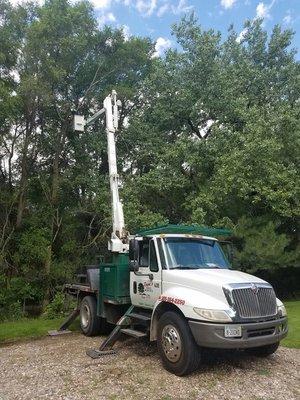 Our 70' Bucket Trucks will reach into your yard many times without over stepping on your lawn. We also are able to "Pad In" when necessary.