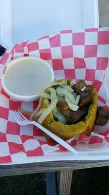 Mofongo with masitas de puerco (fried pork) and sautéed onions. Definitely authentic taste and highly recommend.