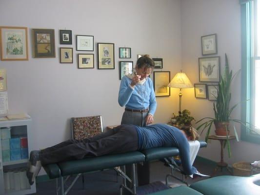 Dr. Heather adjusting a patient