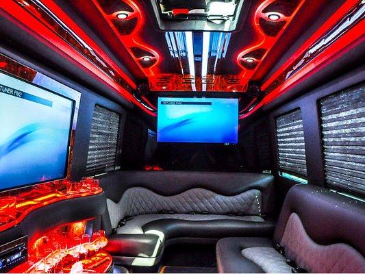 Party Bus interior photo with Luxury Seating, TV's, Surround Sound system