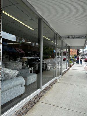 Sidewalk view of store