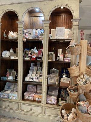 Inside barn; a lovely display case showing silver baby gifts, frames and special gifts!