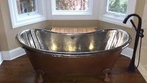 freestanding bathtub installed by Sustainable Plumbing of NC