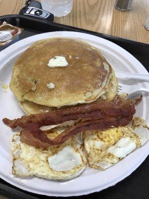 Really good pancakes. Super fluffy. Good texture on the bacon. Over medium eggs cooked perfectly.