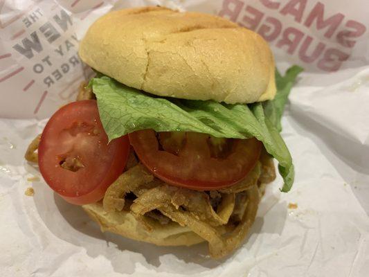 Barbecue bacon burger with lettuce and tomato added