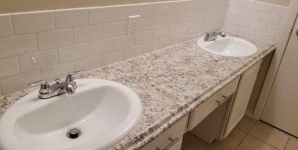 Complete remodel done here. Backsplash, countertop, sinks, etc.