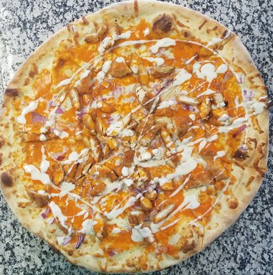 Large Buffalo chicken pizza with red onions drizzled with blue cheese dressing