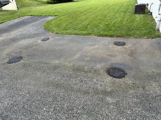 Potholes filled before sealing