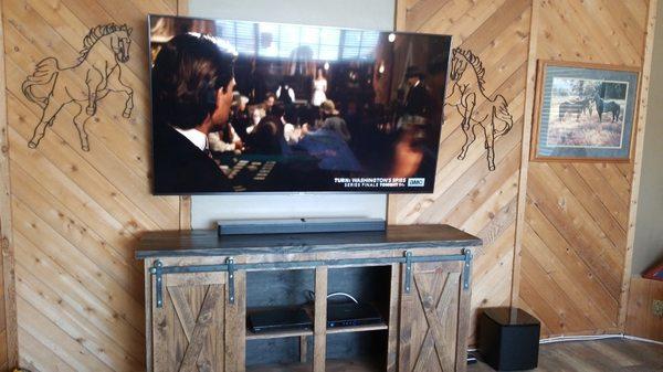 75" Sony LED 4K Ultra HD TV mounted on wall with all wiring concealed