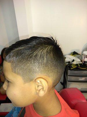 Barber Goins love the kids for a nice summertime haircut bring them to see Mr.Goins