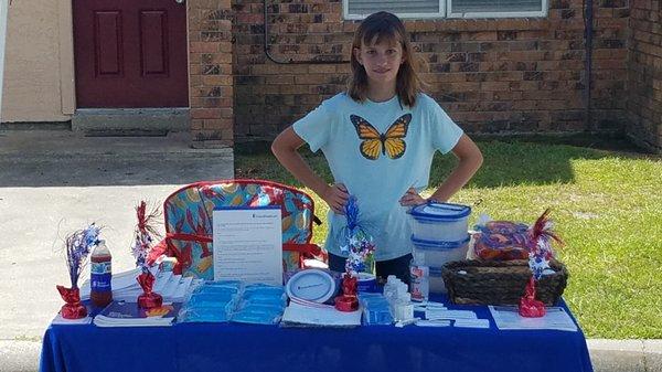 The youngest member of our team helping out at a community event.