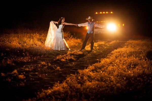 Dancing together at midnight in a rural Oregon wedding.