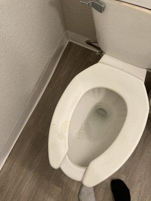 Toilet seat erosion