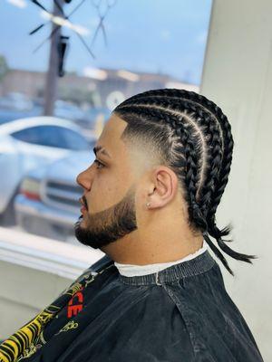 Braids with taper fade and beard