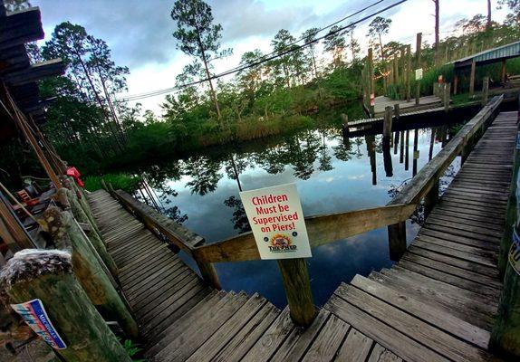 During your stay GET FED AT THE SHED & take advantage of our BLUE WAY PIER next to our boat ramp "Blue Water Marker #8" on Old Fort Bayou.