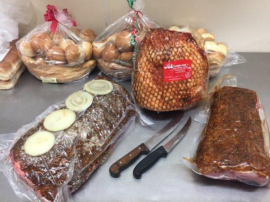 Holiday specialties. Prime rib, natural smoked ham, and seasoned pork loin roast.