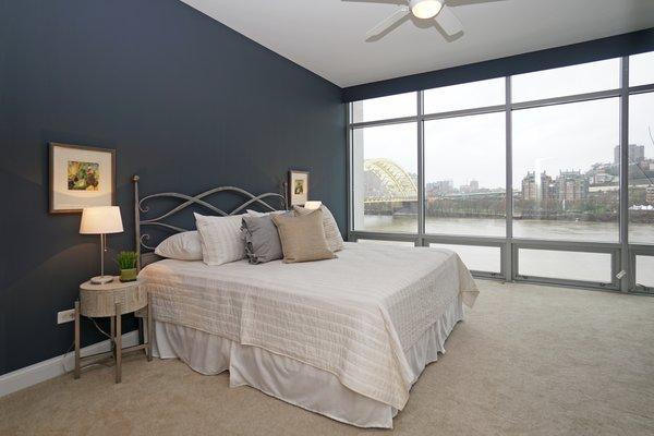 Wall of windows in bedroom. Courtesy Robinson Sotheby's International Realty.