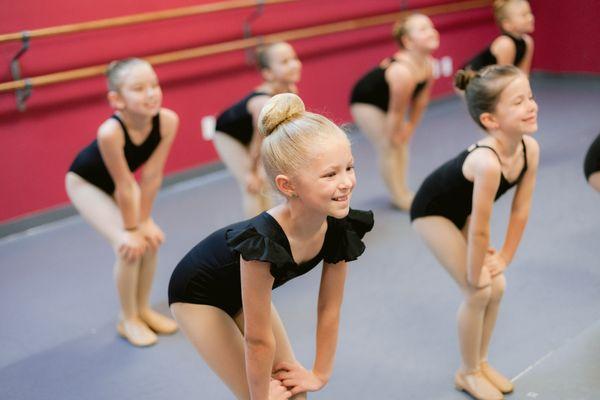 Smiling young jazz dancers