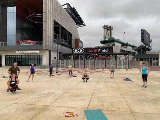 Socially-distanced outdoor classes right outside of Audi Field