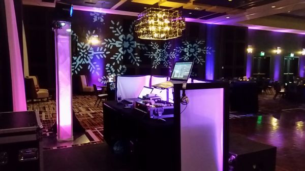 Professional DJs with decorative wall gobos and uplighting. Custom gobos available per request