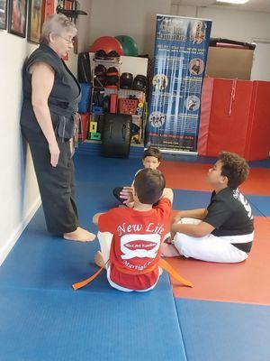 Sensei Angie talking to some of the class