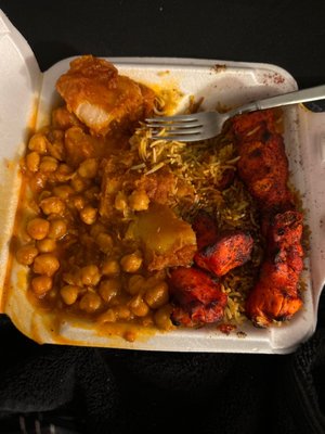 Chicken kabob with potatoes and chick peas.