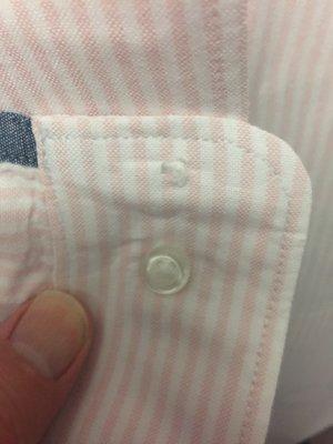 I'm going to have to pay another tailor or cleaner to replace this button