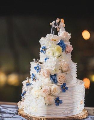 Wedding cake. Half real half fake flowers