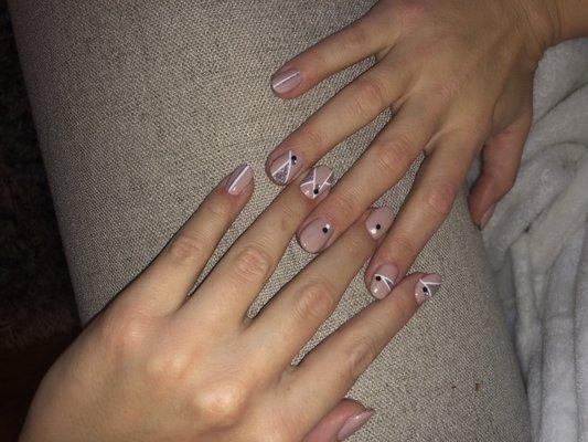 By Priscilla. Almond gel fill-in free-hand design and stones. Color "tiramisu for two"