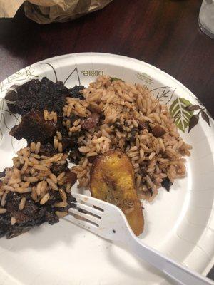 Oxtail and rice and peas with fried plantains.