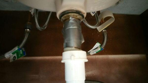 Someone has used duct tape to try and repair the tailpiece on the sink. Ummm. .that's just not right. Lol