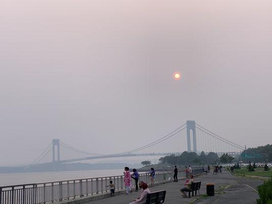 The sun was glowing red tonight because of the wildfires out west mind