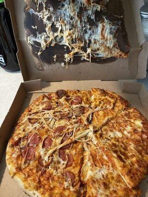 Mangled pizza order from Wausau Toppers