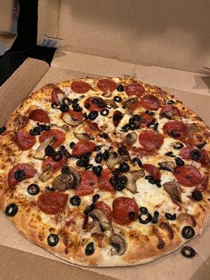 Large pepperoni, olive, and mushroom pizza.