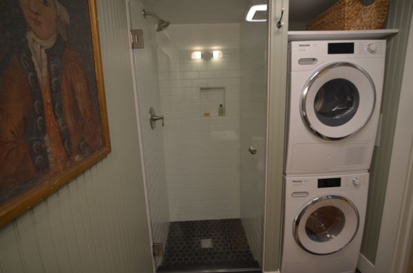 Cozy bathroom with laundry